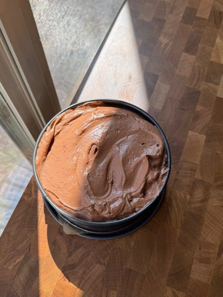 The french silk pie topping on top of the cake.