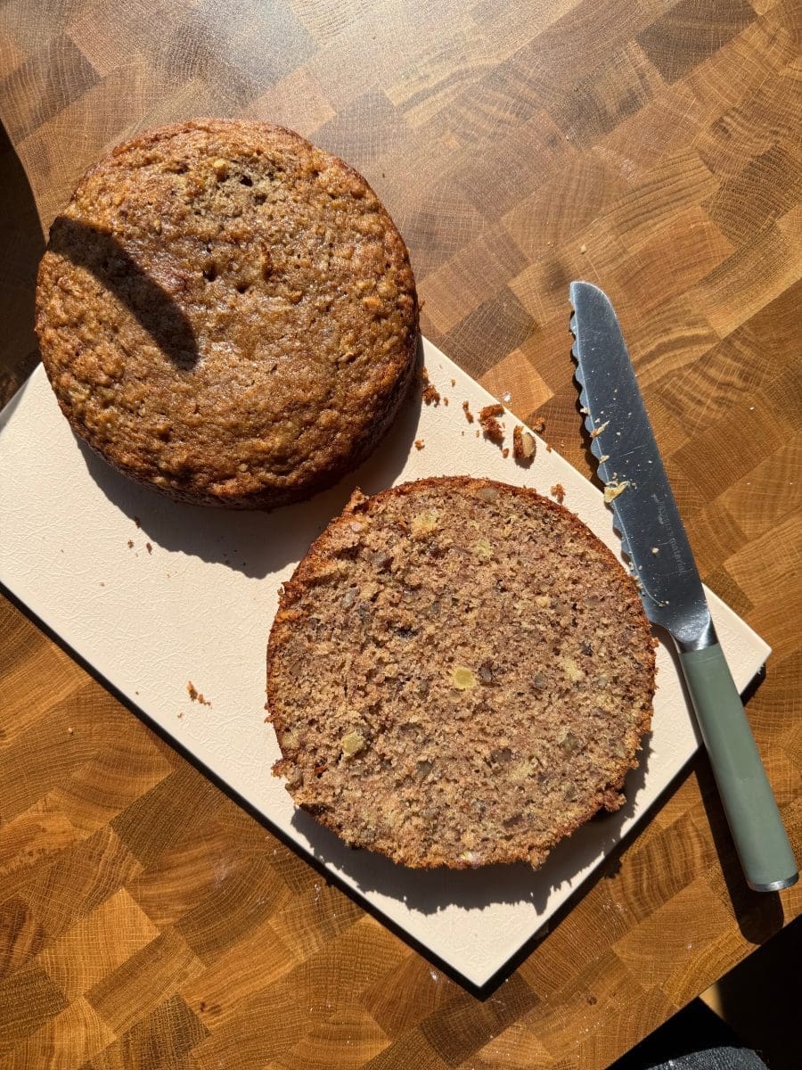 The cake sliced in half horizontally.