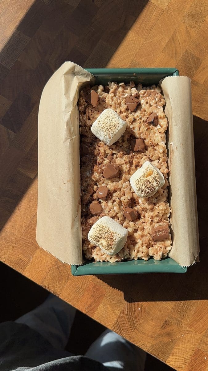 The finished small batch s'mores Rice Krispie in a loaf pan.