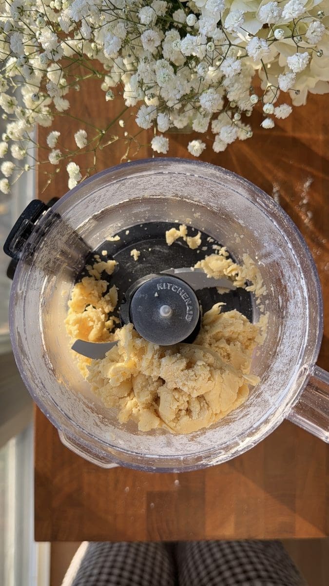 The pie crust in a food processor.