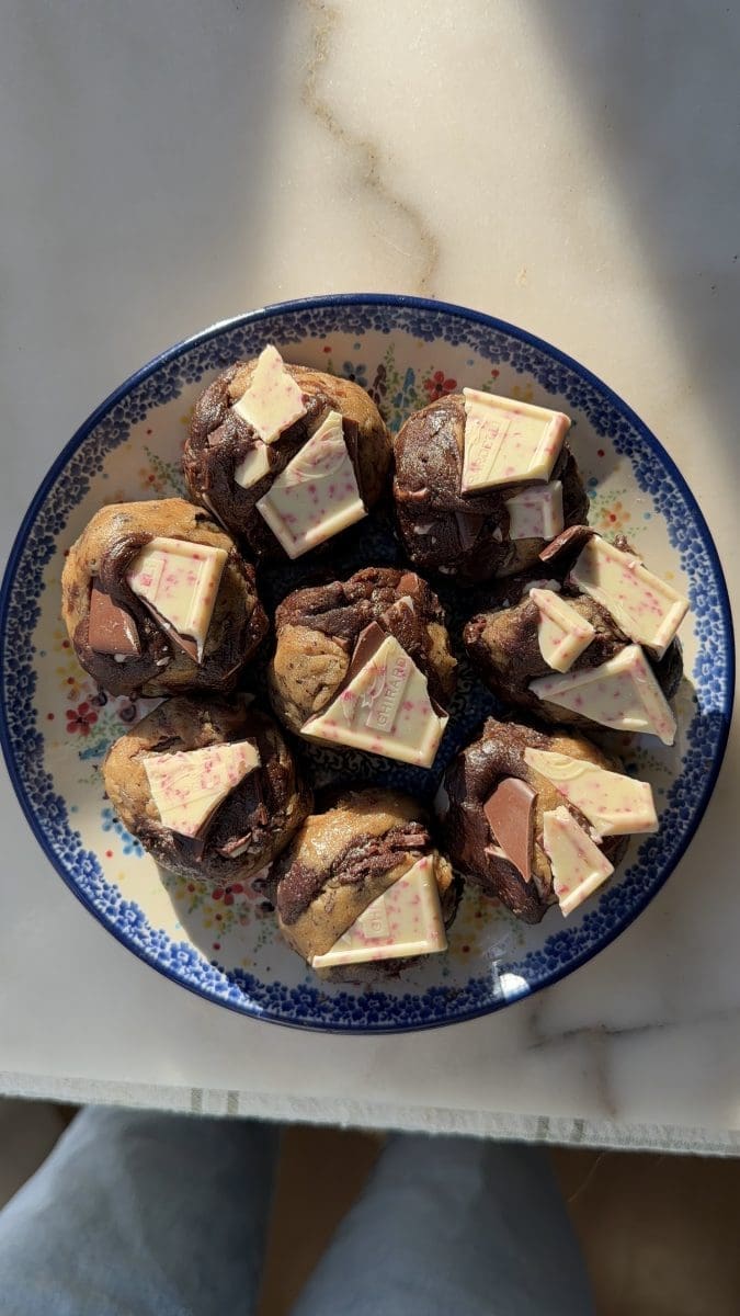The peppermint cookie dough balls on a plate.
