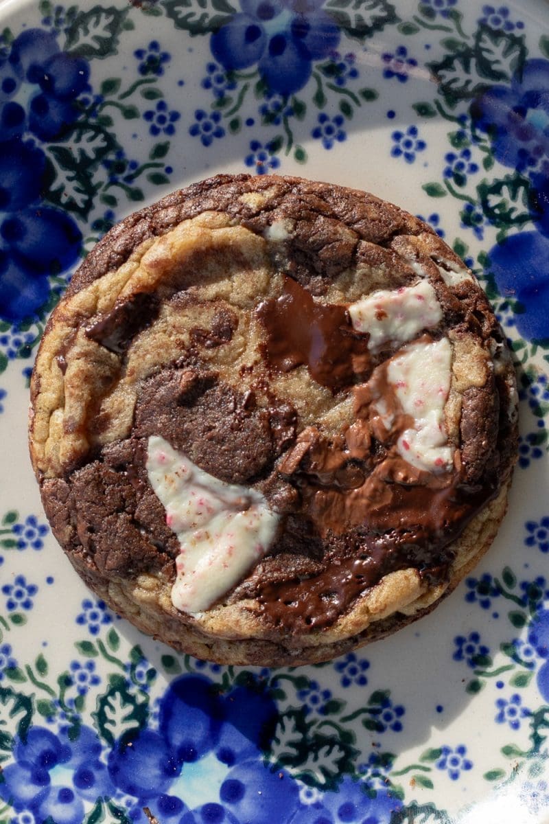 One of the peppermint chocolate chip cookies on a plate.