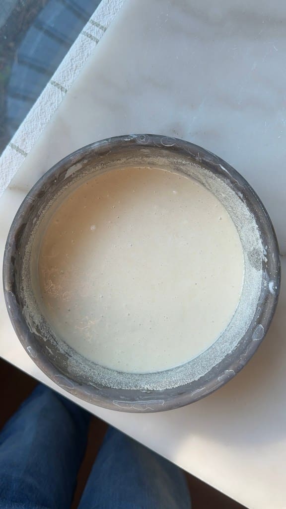 Cake batter in a cake pan before baking